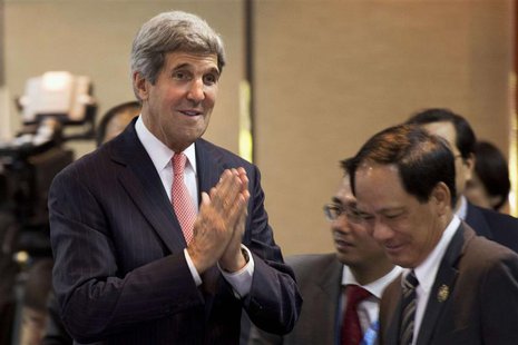 U.S. Secretary of State John Kerry gestures a greeting as he arrives to make opening remarks at the US-ASEAN Ministerial meeting, in Bandar U.S. Secretary of State John Kerry gestures a greeting as he arrives to make opening remarks at the US-ASEAN Ministerial meeting, in Bandar