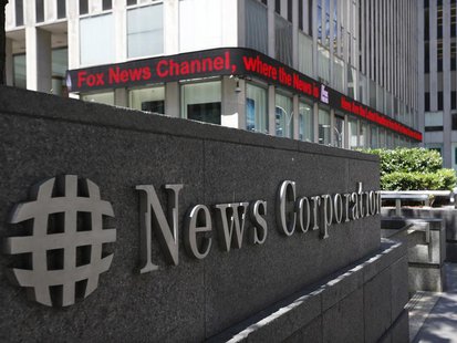 A sign is seen outside News Corporation building in New York, June 27, 2012. REUTERS/Brendan McDermid A sign is seen outside News Corporation building in New York, June 27, 2012. REUTERS/Brendan McDermid