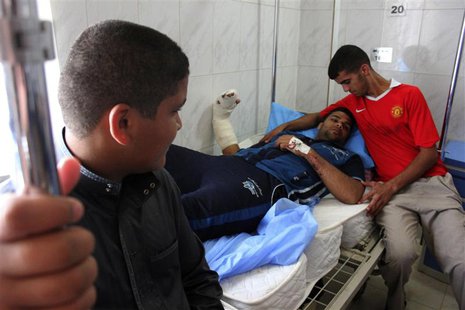 A man lies on a hospital bed after being wounded during one of two bomb attacks in the city of Baquba, about 50 km (31 miles) northeast of B A man lies on a hospital bed after being wounded during one of two bomb attacks in the city of Baquba, about 50 km (31 miles) northeast of B
