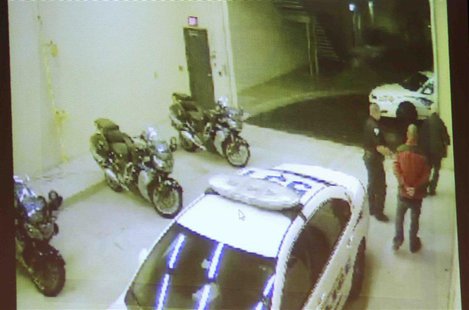 George Zimmerman arriving at the Sanford police station on the night of the Trayvon Martin shooting is projected for the jury in this State George Zimmerman arriving at the Sanford police station on the night of the Trayvon Martin shooting is projected for the jury in this State