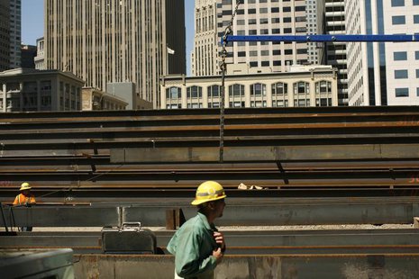 Workers guide steel beams into place at a construction site in San Francisco, California September 1, 2011. REUTERS/Robert Galbraith Workers guide steel beams into place at a construction site in San Francisco, California September 1, 2011. REUTERS/Robert Galbraith