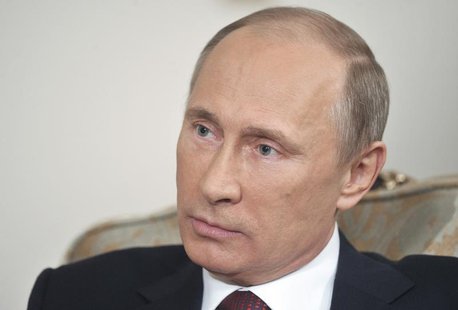 Russian President Vladimir Putin listens during an interview with German public broadcaster ARD at the Novo-Ogaryovo residence outside Mosco Russian President Vladimir Putin listens during an interview with German public broadcaster ARD at the Novo-Ogaryovo residence outside Mosco