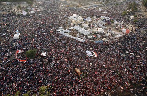 Protesters opposing Egyptian President Mohamed Mursi take part in a protest demanding that Mursi resign at Tahrir Square in Cairo July 1, 20 Protesters opposing Egyptian President Mohamed Mursi take part in a protest demanding that Mursi resign at Tahrir Square in Cairo July 1, 20