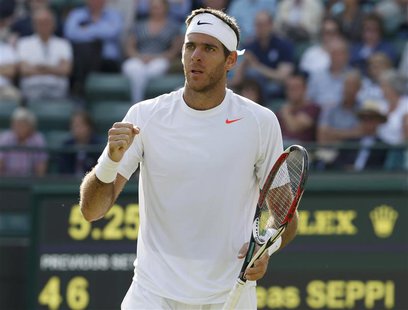 Juan Martin del Potro of Argentina celebrates after defeating Andreas Seppi of Italy in their men's singles tennis match at the Wimbledon Te Juan Martin del Potro of Argentina celebrates after defeating Andreas Seppi of Italy in their men's singles tennis match at the Wimbledon Te