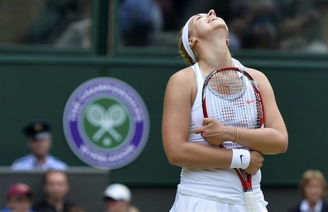 Sabine Lisicki of Germany reacts during her women's singles tennis match against Serena Williams of the U.S. at the Wimbledon Tennis Champio Sabine Lisicki of Germany reacts during her women's singles tennis match against Serena Williams of the U.S. at the Wimbledon Tennis Champio