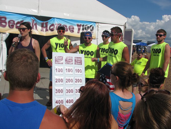 Jess Kelley playing games with Y100 Beach Boys.