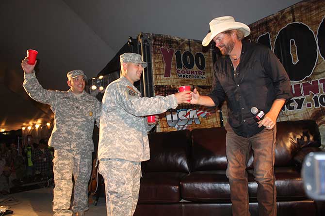 Toby toasts with troops in the Y100 Country Club!