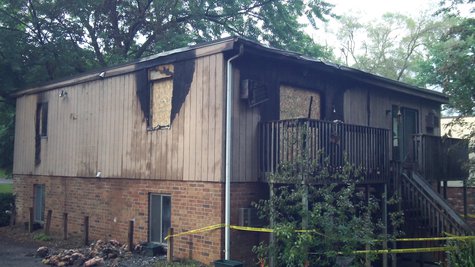 The fire was contained to the upper story apartment, but there was water damage to the apartment below. The fire was contained to the upper story apartment, but there was water damage to the apartment below.