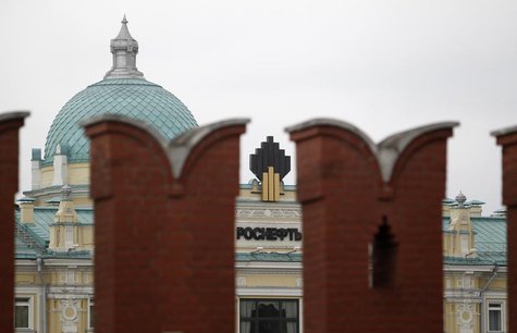 The logo of Russia's top crude producer Rosneft is seen at the company's headquarters, behind the Kremlin wall, in central Moscow May 27, 20 The logo of Russia's top crude producer Rosneft is seen at the company's headquarters, behind the Kremlin wall, in central Moscow May 27, 20