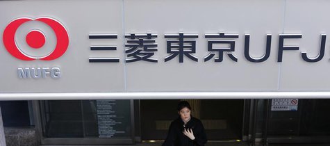 A woman walks out from a branch of Mitsubishi UFJ Financial Group (MUFG) in Tokyo November 14, 2012. REUTERS/Yuriko Nakao A woman walks out from a branch of Mitsubishi UFJ Financial Group (MUFG) in Tokyo November 14, 2012. REUTERS/Yuriko Nakao