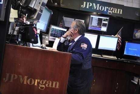 A trader works at the JP Morgan trading post on the floor of the New York Stock Exchange in New York July 13, 2012. REUTERS/Shannon Stapleto A trader works at the JP Morgan trading post on the floor of the New York Stock Exchange in New York July 13, 2012. REUTERS/Shannon Stapleto