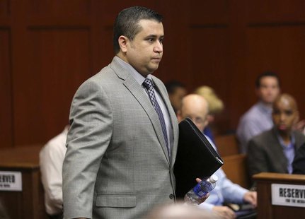 George Zimmerman enters the courtroom during his second-degree murder trial in Seminole circuit court in Sanford, Florida, July 2, 2013. REU George Zimmerman enters the courtroom during his second-degree murder trial in Seminole circuit court in Sanford, Florida, July 2, 2013. REU