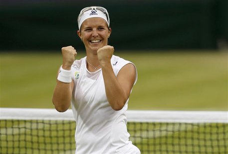 Kirsten Flipkens of Belgium celebrates after defeating Petra Kvitova of the Czech Republic in their women's quarter-final tennis match at th Kirsten Flipkens of Belgium celebrates after defeating Petra Kvitova of the Czech Republic in their women's quarter-final tennis match at th
