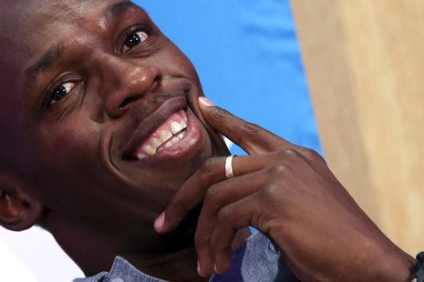 Jamaican sprinter Usain Bolt attends a news conference in Paris July 2, 2013. Bolt takes part in the IAAF Diamond League athletics event at Jamaican sprinter Usain Bolt attends a news conference in Paris July 2, 2013. Bolt takes part in the IAAF Diamond League athletics event at