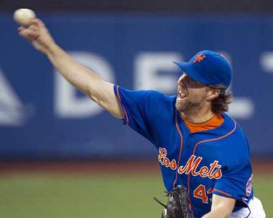 COULDN'T HE HAVE JUST STAYED IN NY? Current Toronto pitcher RA Dickey flashed the Cy Young-winning form seen here during his New York Mets days as he pitched the Blue Jays past the Tigers on Canada Day, 8-3. REUTERS/Ray Stubblebine COULDN'T HE HAVE JUST STAYED IN NY? Current Toronto pitcher RA Dickey flashed the Cy Young-winning form seen here during his New York Mets days as he pitched the Blue Jays past the Tigers on Canada Day, 8-3. REUTERS/Ray Stubblebine