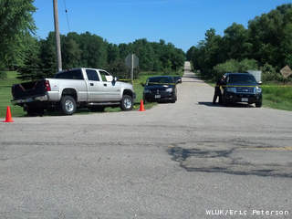 N. 5th Rd. in the Marinette County town of Pound is closed off north of County Hwy. B, July 2, 2013, as sheriff's deputies investigate a pair of fatal shootings. (courtesy of FOX 11). N. 5th Rd. in the Marinette County town of Pound is closed off north of County Hwy. B, July 2, 2013, as sheriff's deputies investigate a pair of fatal shootings. (courtesy of FOX 11).