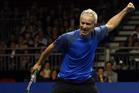 John McEnroe of the U.S. reacts after winning a point during his BNP Paribas Showdown friendly tennis match against compatriot Ivan Lendl in John McEnroe of the U.S. reacts after winning a point during his BNP Paribas Showdown friendly tennis match against compatriot Ivan Lendl in