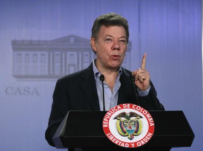 Colombia's President Juan Manuel Santos gestures during a news conference at the Narino presidential house in Bogota May 30, 2013. REUTERS/J Colombia's President Juan Manuel Santos gestures during a news conference at the Narino presidential house in Bogota May 30, 2013. REUTERS/J