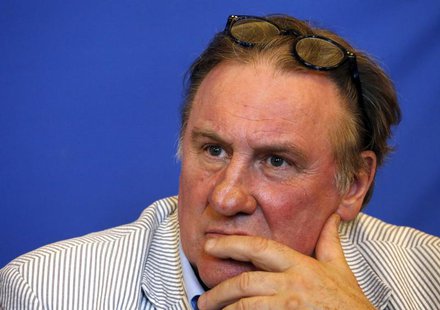 Actor Gerard Depardieu attends a news conference to present the 1st edition of a Russian Film Festival in Nice June 6, 2013. REUTERS/Eric Ga Actor Gerard Depardieu attends a news conference to present the 1st edition of a Russian Film Festival in Nice June 6, 2013. REUTERS/Eric Ga