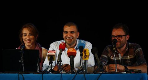 Mohamed Bennour (C), coordinator of the Tunisia Tamarod (rebel) movement, speaks at a news conference in Tunis July 3, 2013. REUTERS/Zoubeir Mohamed Bennour (C), coordinator of the Tunisia Tamarod (rebel) movement, speaks at a news conference in Tunis July 3, 2013. REUTERS/Zoubeir