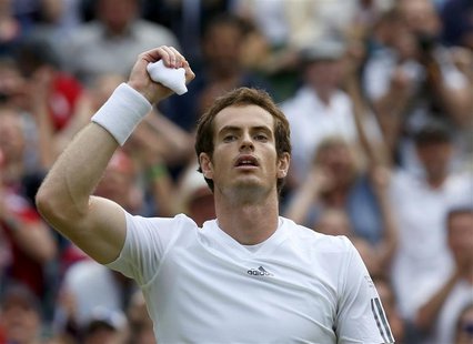 Andy Murray of Britain celebrates after defeating Fernando Verdasco of Spain in their men's quarter-final tennis match at the Wimbledon Tenn Andy Murray of Britain celebrates after defeating Fernando Verdasco of Spain in their men's quarter-final tennis match at the Wimbledon Tenn