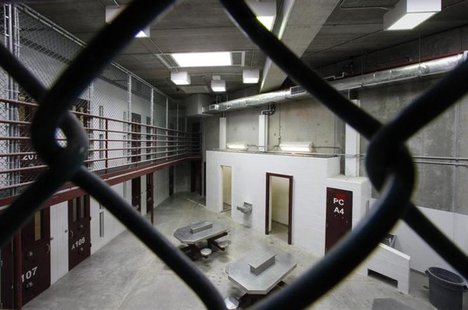 The interior of an unoccupied communal cellblock is seen at Camp VI, a prison used to house detainees at the U.S. Naval Base at Guantanamo B The interior of an unoccupied communal cellblock is seen at Camp VI, a prison used to house detainees at the U.S. Naval Base at Guantanamo B