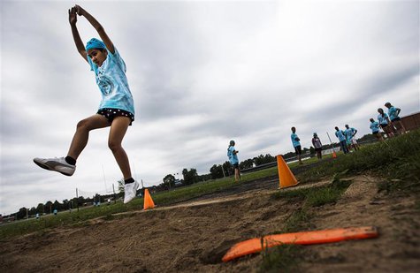 Dah Ku participates in long jump at Camp Abilities in Brockport, New York, June 25, 2013. REUTERS/Mark Blinch Dah Ku participates in long jump at Camp Abilities in Brockport, New York, June 25, 2013. REUTERS/Mark Blinch
