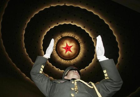 The conductor of a military band performs during the rehearsal ahead of the opening ceremony of the Chinese People's Political Consultative The conductor of a military band performs during the rehearsal ahead of the opening ceremony of the Chinese People's Political Consultative