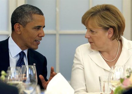 U.S. President Barack Obama and German Chancellor Angela Merkel (R) chat during at the Chralottenburg Castle in Berlin June 19, 2013. REUTER U.S. President Barack Obama and German Chancellor Angela Merkel (R) chat during at the Chralottenburg Castle in Berlin June 19, 2013. REUTER
