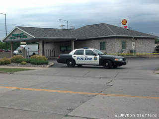 Green Bay police investigate a report of an armed robbery at Pioneer Credit Union, 1065 Velp Ave., July 3, 2013. (courtesy of FOX 11). Green Bay police investigate a report of an armed robbery at Pioneer Credit Union, 1065 Velp Ave., July 3, 2013. (courtesy of FOX 11).