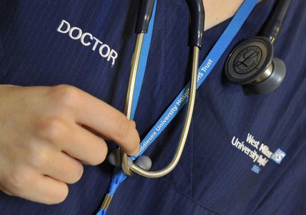 A doctor holds her stethoscope in an outpatients ward at a hospital in west London April 4, 2011. REUTERS/Toby Melville A doctor holds her stethoscope in an outpatients ward at a hospital in west London April 4, 2011. REUTERS/Toby Melville