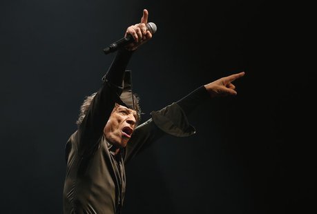 Lead singer of the Rolling Stones Mick Jagger performs on the Pyramid Stage at Glastonbury music festival at Worthy Farm in Somerset, June 2 Lead singer of the Rolling Stones Mick Jagger performs on the Pyramid Stage at Glastonbury music festival at Worthy Farm in Somerset, June 2