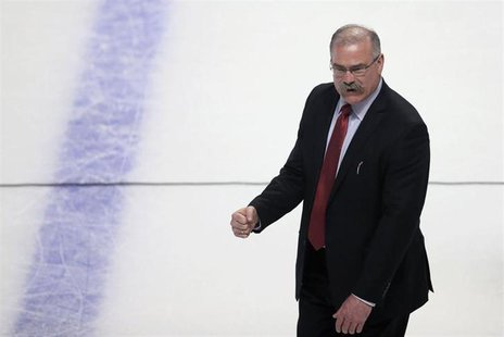 Ottawa Senators' head coach Paul MacLean celebrates after defeating the Montreal Canadiens in Game 5 of their NHL Eastern Conference quarter Ottawa Senators' head coach Paul MacLean celebrates after defeating the Montreal Canadiens in Game 5 of their NHL Eastern Conference quarter