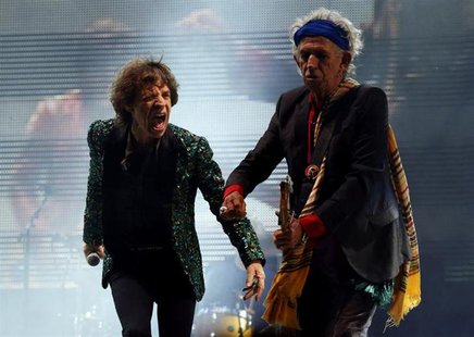 Mick Jagger (L) and Keith Richards of the Rolling Stones perform on the Pyramid Stage at Glastonbury music festival at Worthy Farm in Somers Mick Jagger (L) and Keith Richards of the Rolling Stones perform on the Pyramid Stage at Glastonbury music festival at Worthy Farm in Somers
