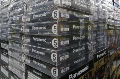 Panasonic Corp's logos are seen at an electronics store in Tokyo May 9, 2013. REUTERS/Toru Hanai Panasonic Corp's logos are seen at an electronics store in Tokyo May 9, 2013. REUTERS/Toru Hanai