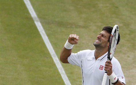Novak Djokovic of Serbia celebrates after defeating Tomas Berdych of the Czech Republic in their men's quarter-final tennis match at the Wim Novak Djokovic of Serbia celebrates after defeating Tomas Berdych of the Czech Republic in their men's quarter-final tennis match at the Wim