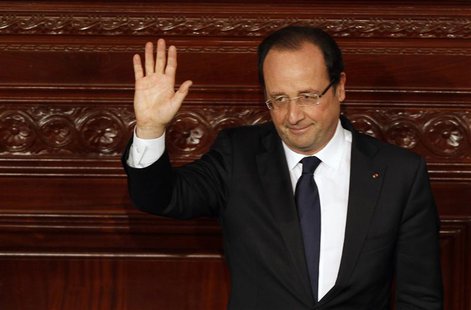 France's President Francois Hollande waves after delivering a speech at the Constituent Assembly in Tunis July 5, 2013. REUTERS/Zoubeir Soui France's President Francois Hollande waves after delivering a speech at the Constituent Assembly in Tunis July 5, 2013. REUTERS/Zoubeir Soui