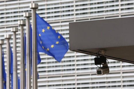 A security camera is seen at the main entrance of the European Union Commission headquarters in Brussels July 1, 2013. REUTERS/Francois Leno A security camera is seen at the main entrance of the European Union Commission headquarters in Brussels July 1, 2013. REUTERS/Francois Leno