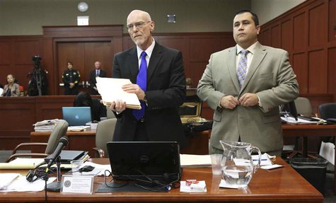 Defense attorney Don West (R) stands with George Zimmerman during his second-degree murder trial in Sanford, Florida, July 5, 2013. REUTERS/ Defense attorney Don West (R) stands with George Zimmerman during his second-degree murder trial in Sanford, Florida, July 5, 2013. REUTERS/