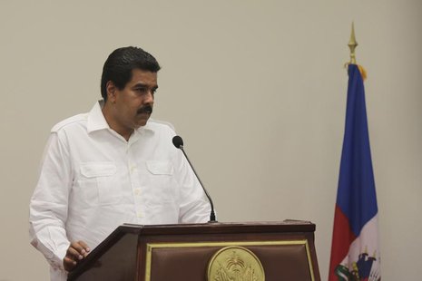 Venezuela's President Nicolas Maduro talks to the media during a news conference in Port-au-Prince, in this handout photo provided by Mirafl Venezuela's President Nicolas Maduro talks to the media during a news conference in Port-au-Prince, in this handout photo provided by Mirafl
