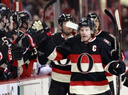 Ottawa Senators' captain Daniel Alfredsson celebrates his goal against the Tampa Bay Lightning during the first period of their NHL hockey g Ottawa Senators' captain Daniel Alfredsson celebrates his goal against the Tampa Bay Lightning during the first period of their NHL hockey g