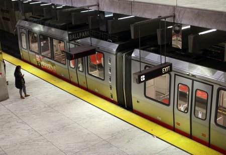 A woman waits for a MUNI train at the Embarcadero station as 2,400 employees of the Bay Area Rapid Transit (BART) commuter rail system go on A woman waits for a MUNI train at the Embarcadero station as 2,400 employees of the Bay Area Rapid Transit (BART) commuter rail system go on