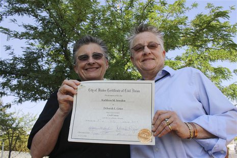 Kathy Sowden (L), 57, and partner Deborah Grier, 63, hold their Certificate of Civil Union in Bisbee, Arizona, July 5, 2013. REUTERS/Brad Po Kathy Sowden (L), 57, and partner Deborah Grier, 63, hold their Certificate of Civil Union in Bisbee, Arizona, July 5, 2013. REUTERS/Brad Po