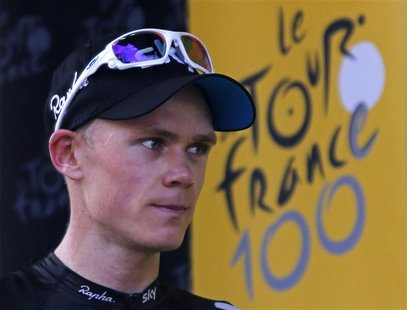 Team Sky rider Christopher Froome of Britain arrives on the podium after he won the 195 km eight stage of the centenary Tour de France cycli Team Sky rider Christopher Froome of Britain arrives on the podium after he won the 195 km eight stage of the centenary Tour de France cycli