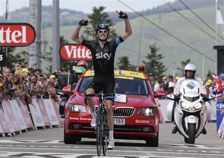 Team Sky rider Christopher Froome of Britain celebrates as he wins the 195 km eight stage of the centenary Tour de France cycling race from Team Sky rider Christopher Froome of Britain celebrates as he wins the 195 km eight stage of the centenary Tour de France cycling race from