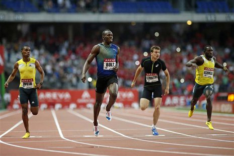 Usain Bolt of Jamaica crosses the finish line to win the men's 200 metres event during the IAAF Diamond League athletics meeting at the Stad Usain Bolt of Jamaica crosses the finish line to win the men's 200 metres event during the IAAF Diamond League athletics meeting at the Stad