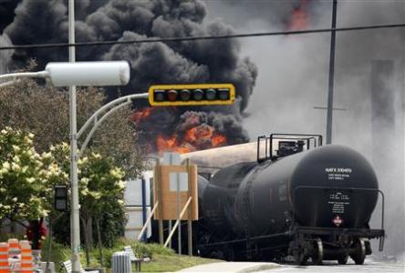 A burning train wagon is seen after an explosion at Lac Megantic, Quebec, July 6, 2013.
REUTERS/Mathieu Belanger A burning train wagon is seen after an explosion at Lac Megantic, Quebec, July 6, 2013.
REUTERS/Mathieu Belanger