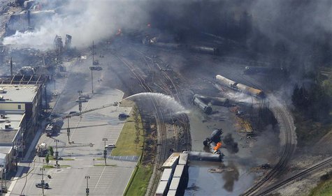 The wreckage of a train is pictured after an explosion in Lac Megantic July 6, 2013. REUTERS/Mathieu Belanger The wreckage of a train is pictured after an explosion in Lac Megantic July 6, 2013. REUTERS/Mathieu Belanger