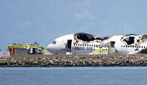An Asiana Airlines Boeing 777 rests on the tarmac after crash landing at San Francisco International Airport in San Francisco, California Ju An Asiana Airlines Boeing 777 rests on the tarmac after crash landing at San Francisco International Airport in San Francisco, California Ju