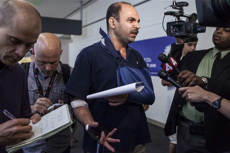 Veddpal Singh, a passenger from the crashed Asiana Airlines Boeing 777, speaks to the members of the press after an Asiana Airlines flight 2 Veddpal Singh, a passenger from the crashed Asiana Airlines Boeing 777, speaks to the members of the press after an Asiana Airlines flight 2